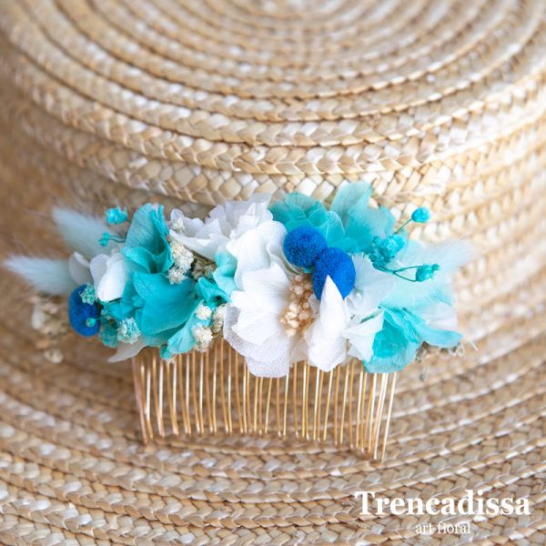 Peineta con flor seca y preservada en tonos azules y blancos