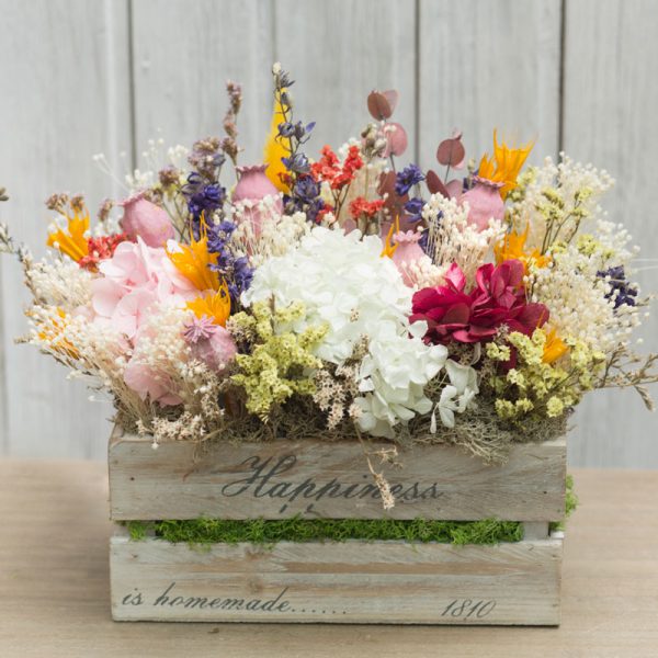 Caja de madera con flor seca en tonos alegres y variados