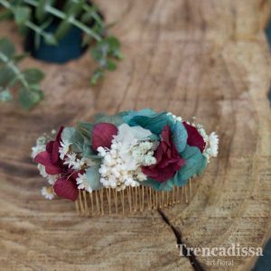 Peineta de flor preservada en tonos turquesa y burdeos